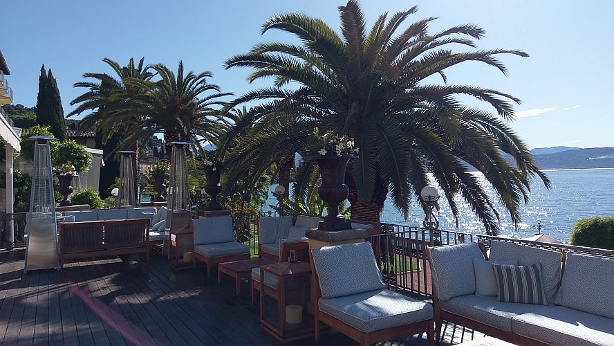 Grand Hotel Fasano: Herrlicher Seeblick über die perfekt gepflegten alten Palmen