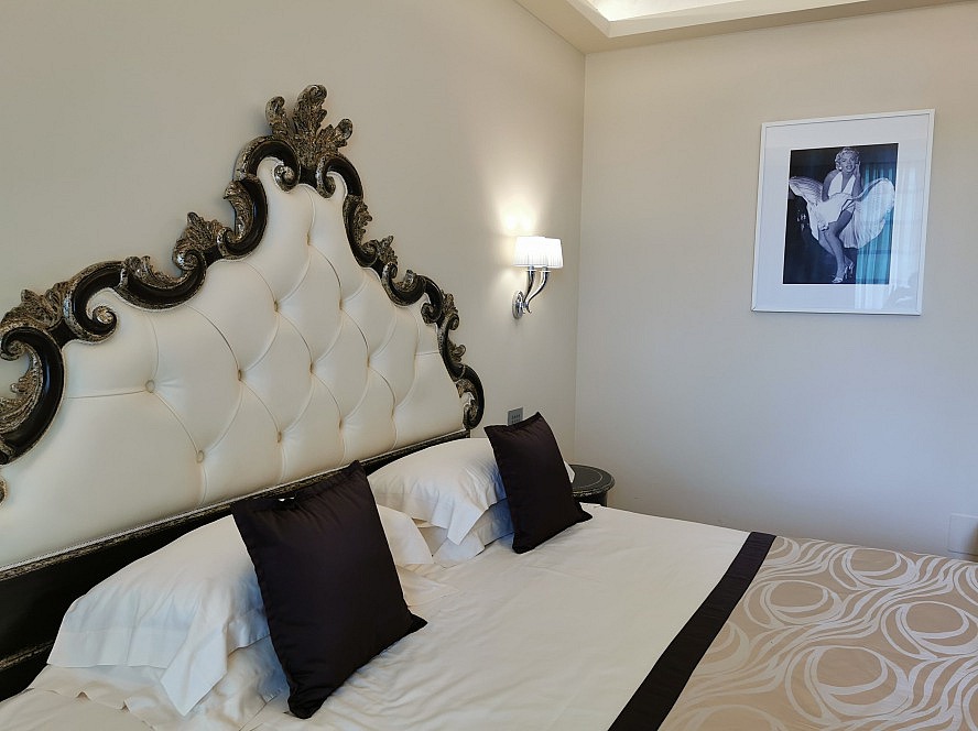 Grand Hotel da Vinci: Das Bild von Marilyn Monroe darf nicht fehlen, schließlich logieren wir in einem von drei zu einer Präsidentensuite kombinierbaren Zimmern.